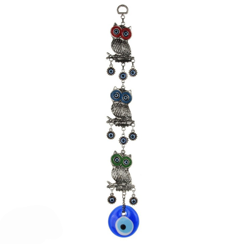 OJO TURCO CON COLUMNA DE BÚHOS